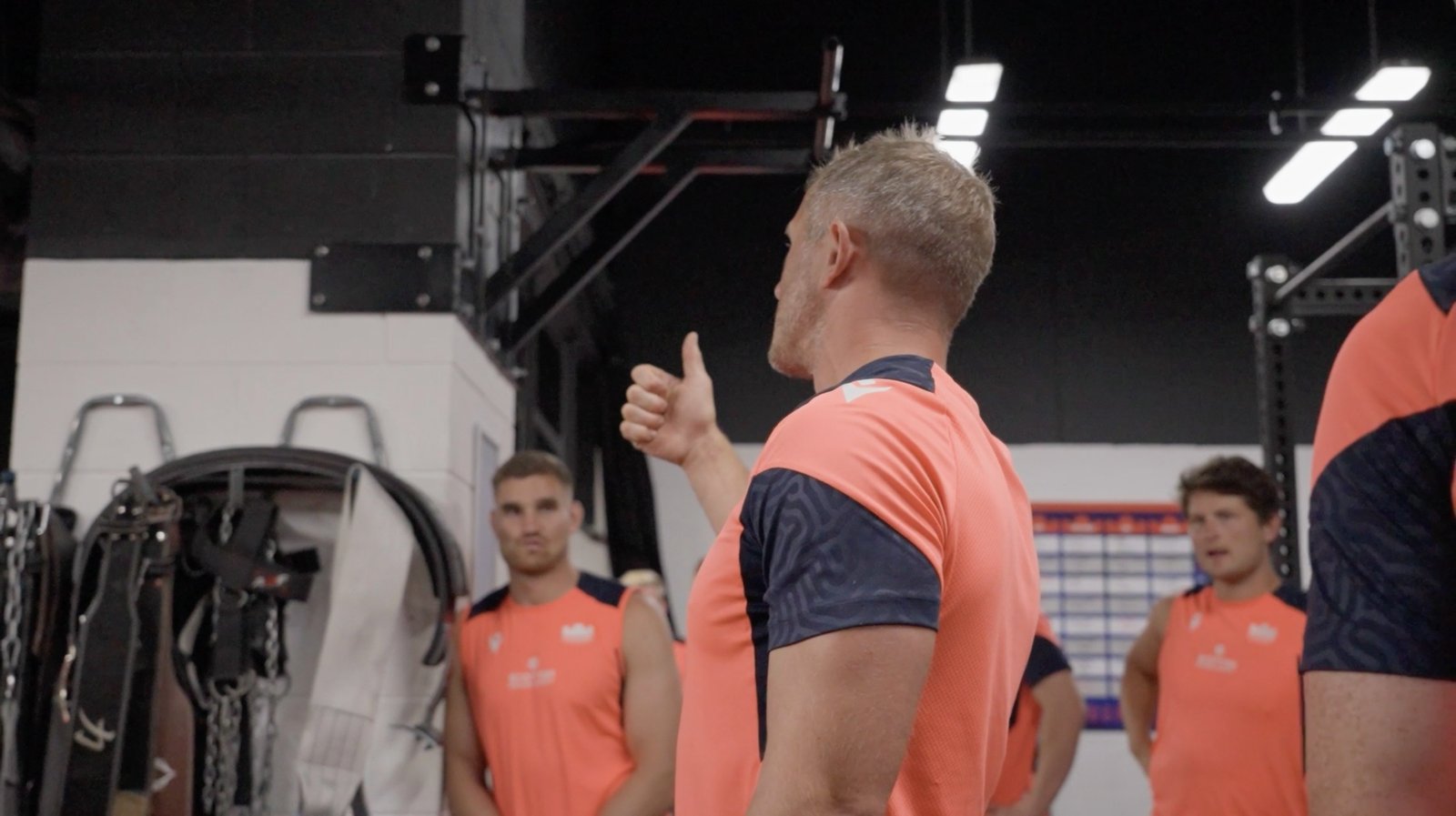 Mark Robertson coaching a group session in the gym